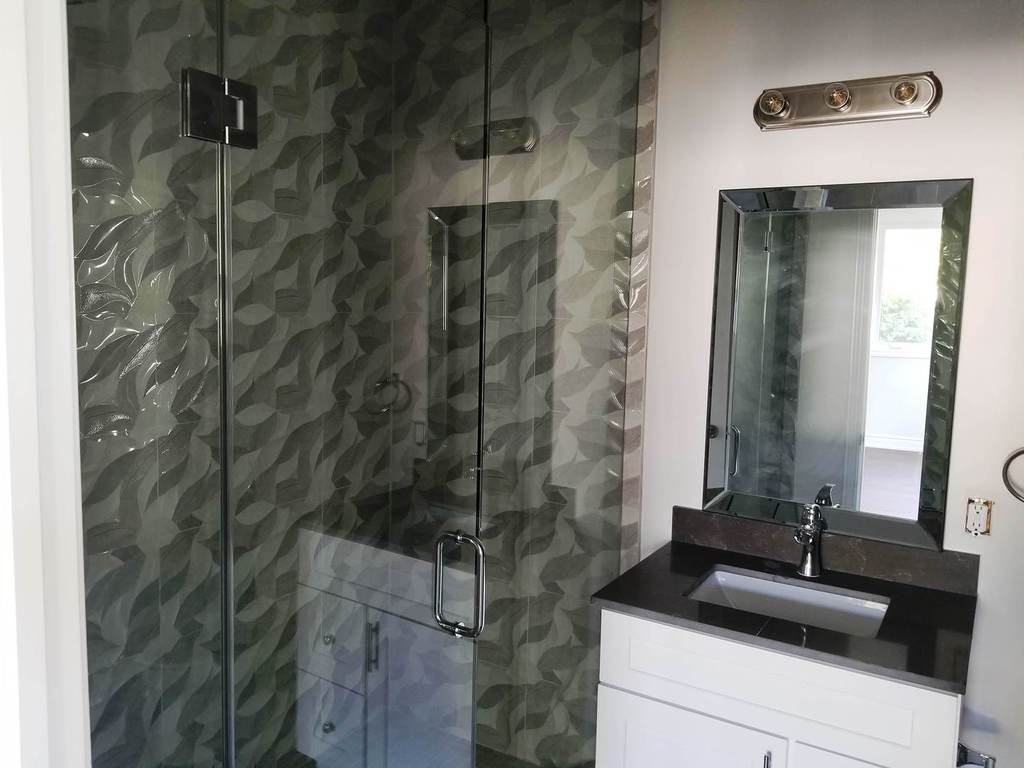 Manefa residential renovation project photo showing updated interior finishes and workmanship: Finished Basement Space