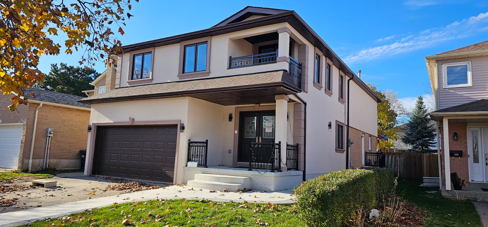 Finished second story addition exterior with updated front elevation and completed finishes