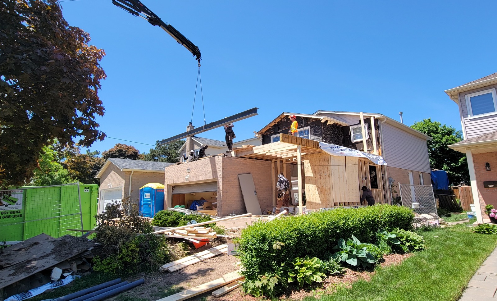 Clear structural framing work during the second story addition construction process